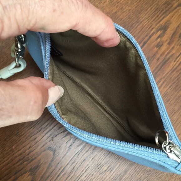 Coach wristlet. Zippered closure. Size 6.5 x 4”.  Baby Blue color- love it! - Picture 5 of 5